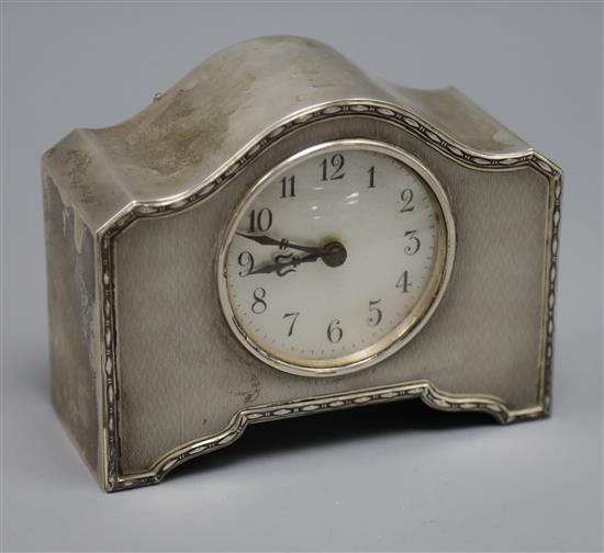 A George V dome topped silver timepiece, with mother of pearl dial, Charles & Richard Comyns, London, 1922, length 15.5cm.